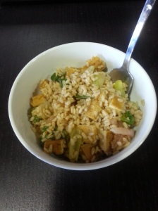 The Wannabe Herbivore: brown rice, red onion, bok choy, and satay tofu.
